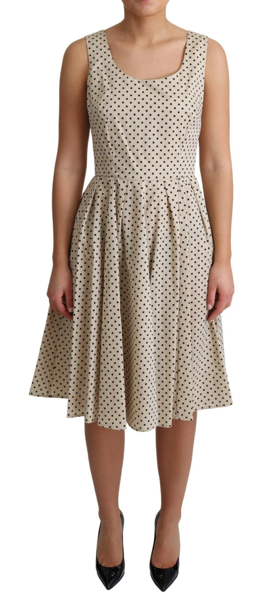 Vestido evasé de algodón con lunares en beige