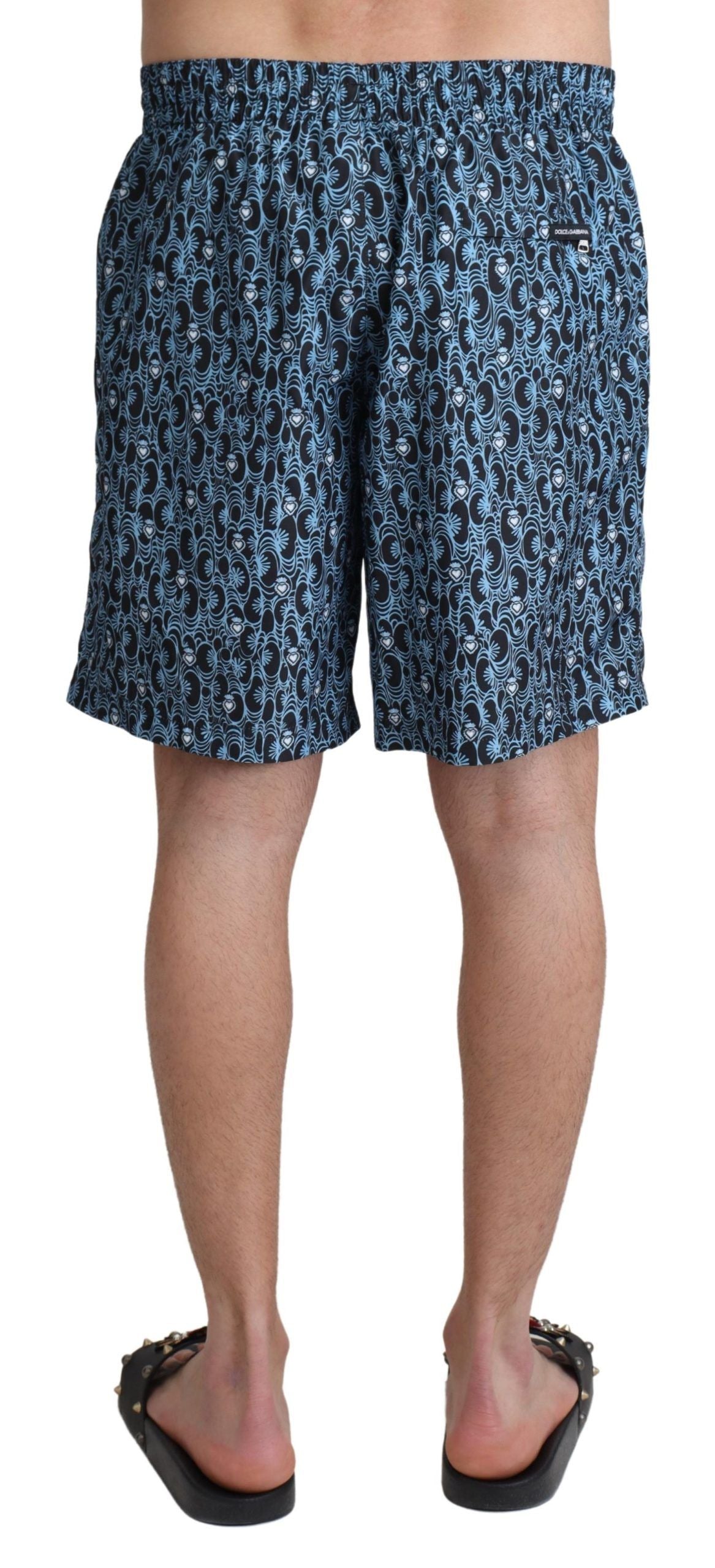 Blaue Badeshorts mit gemustertem Druck und Badebekleidung