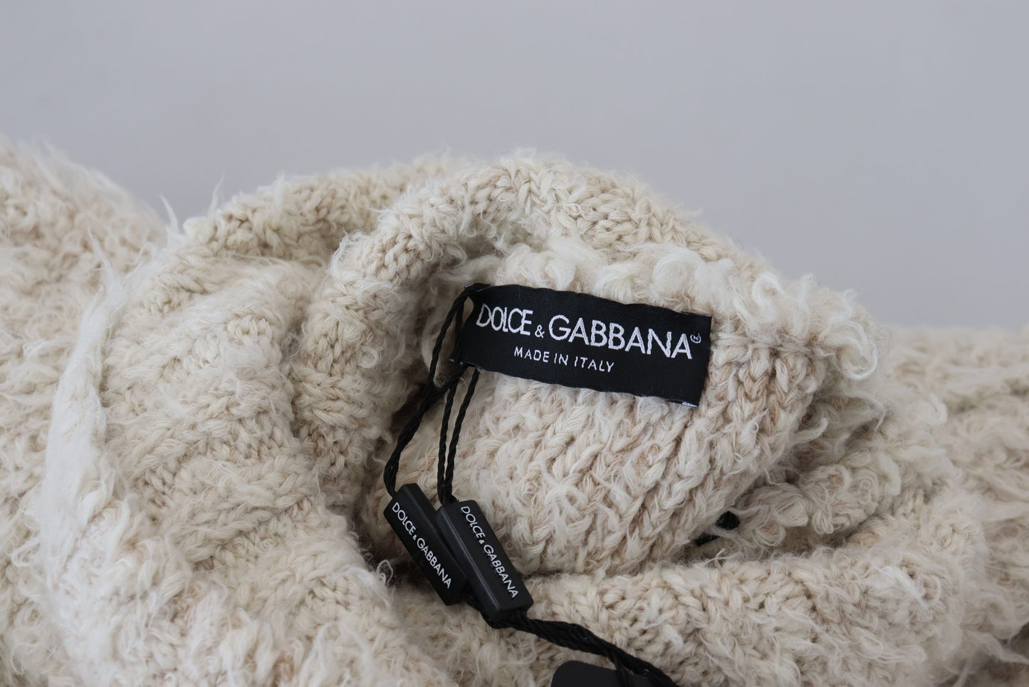 Dolce & Gabbana Eleganter cremefarbener Rollkragenpullover aus Wollmischung
