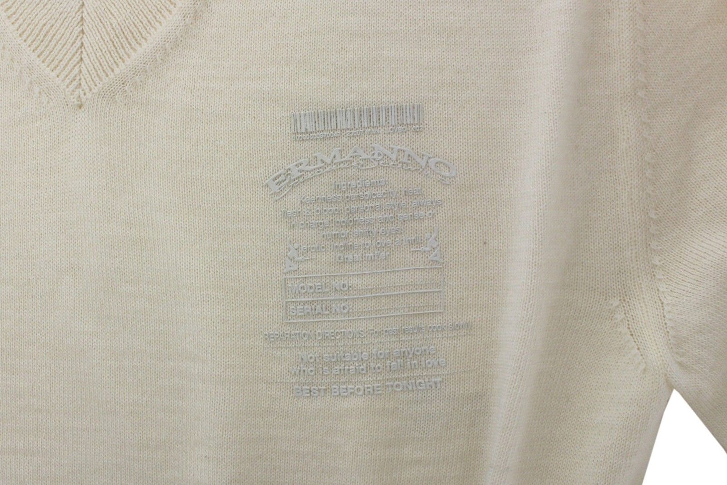 Jersey color blanco roto con cuello en V y mezcla de lana