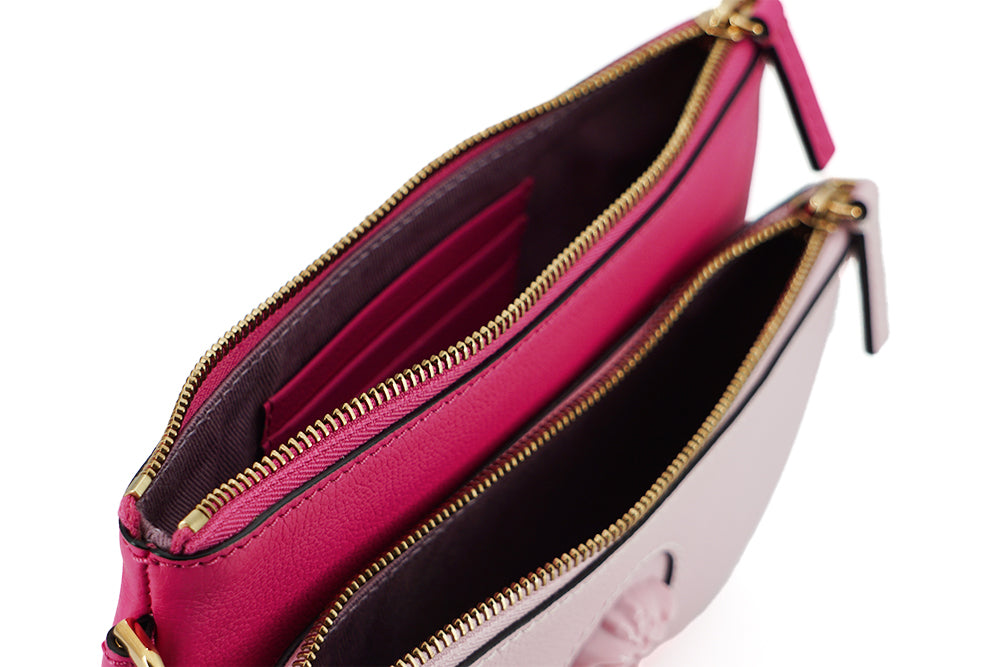 Bolso tipo cartera de piel de becerro rosa