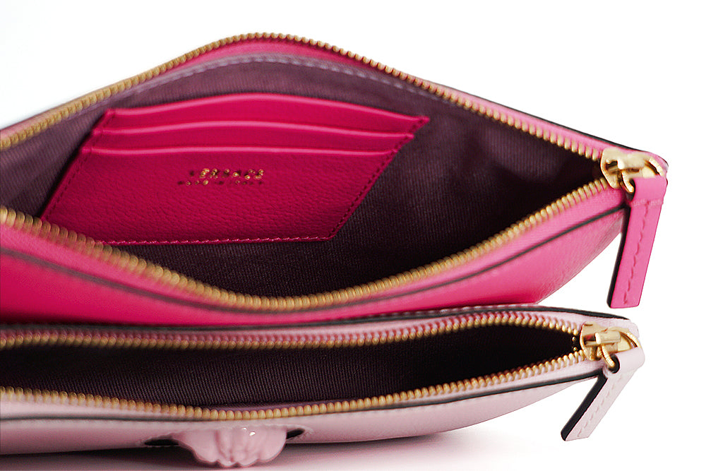Bolso tipo cartera de piel de becerro rosa