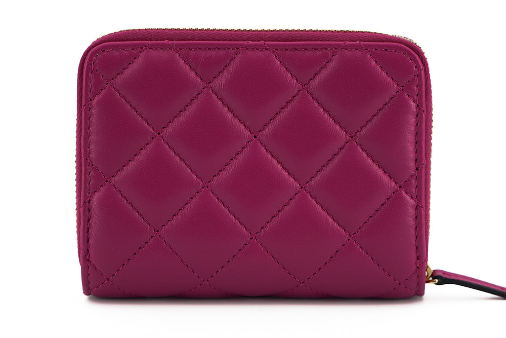 Cartera plegable con cremallera alrededor de piel de napa morada