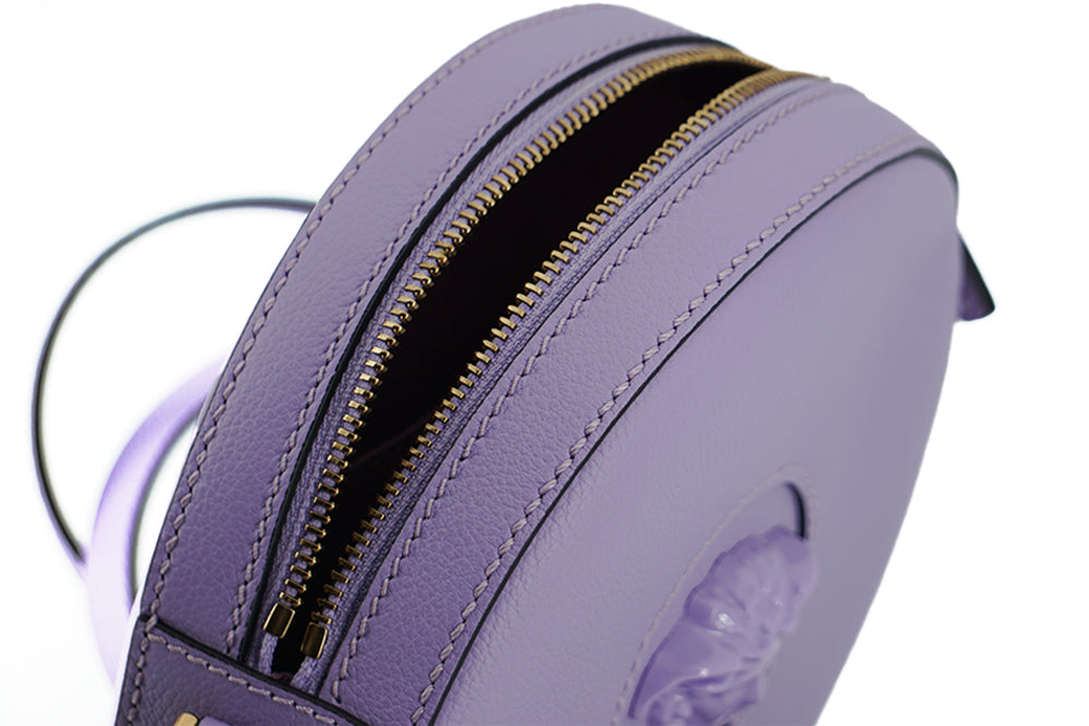 Borsa a tracolla da discoteca rotonda in pelle di vitello viola