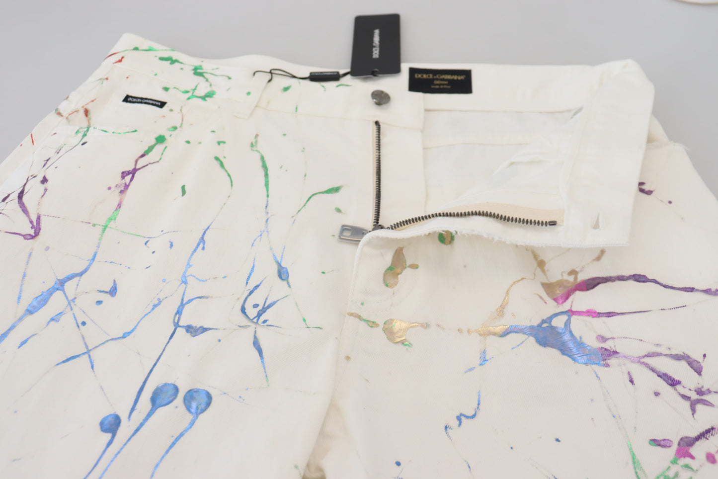 Pantaloni in denim con stampa Splash di colore bianco in cotone