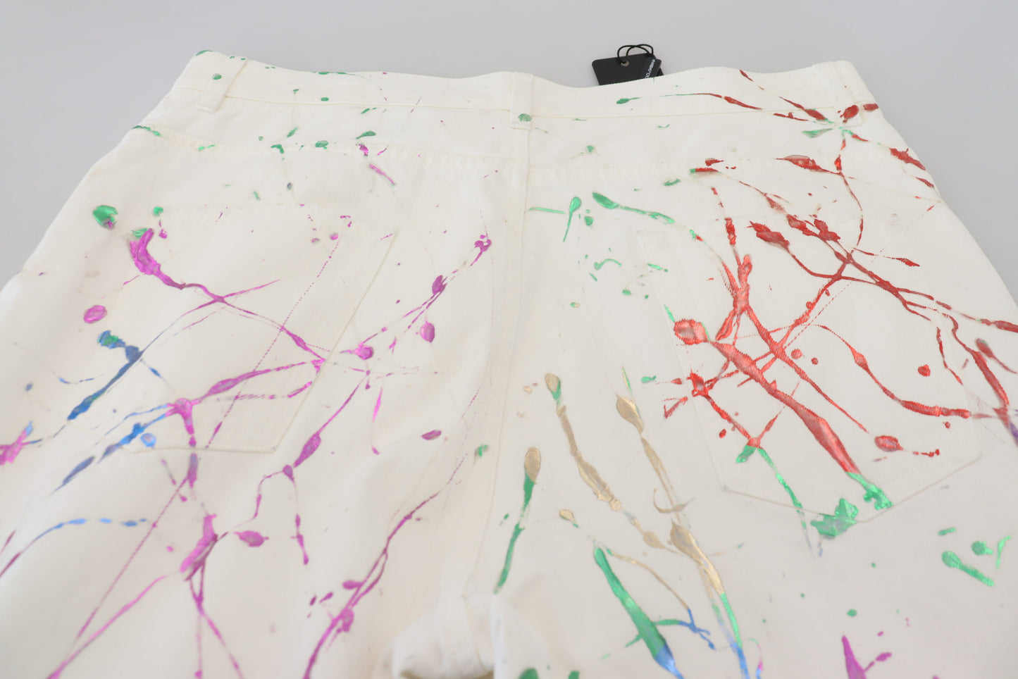 Pantaloni in denim con stampa Splash di colore bianco in cotone