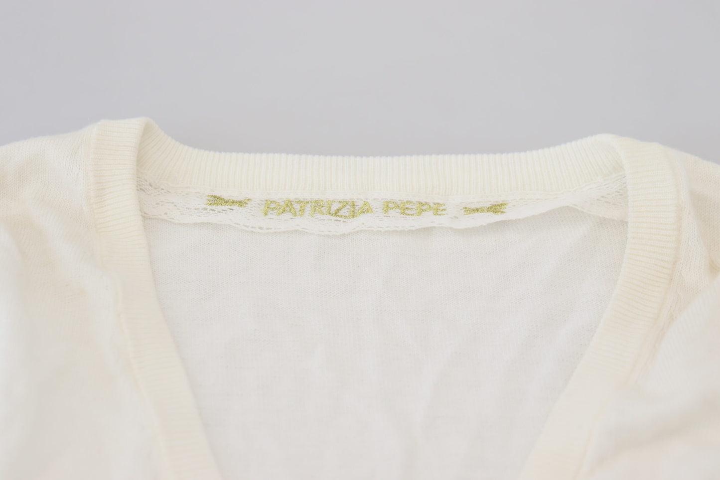 Blusa de mujer de manga larga con cuello en V color marfil