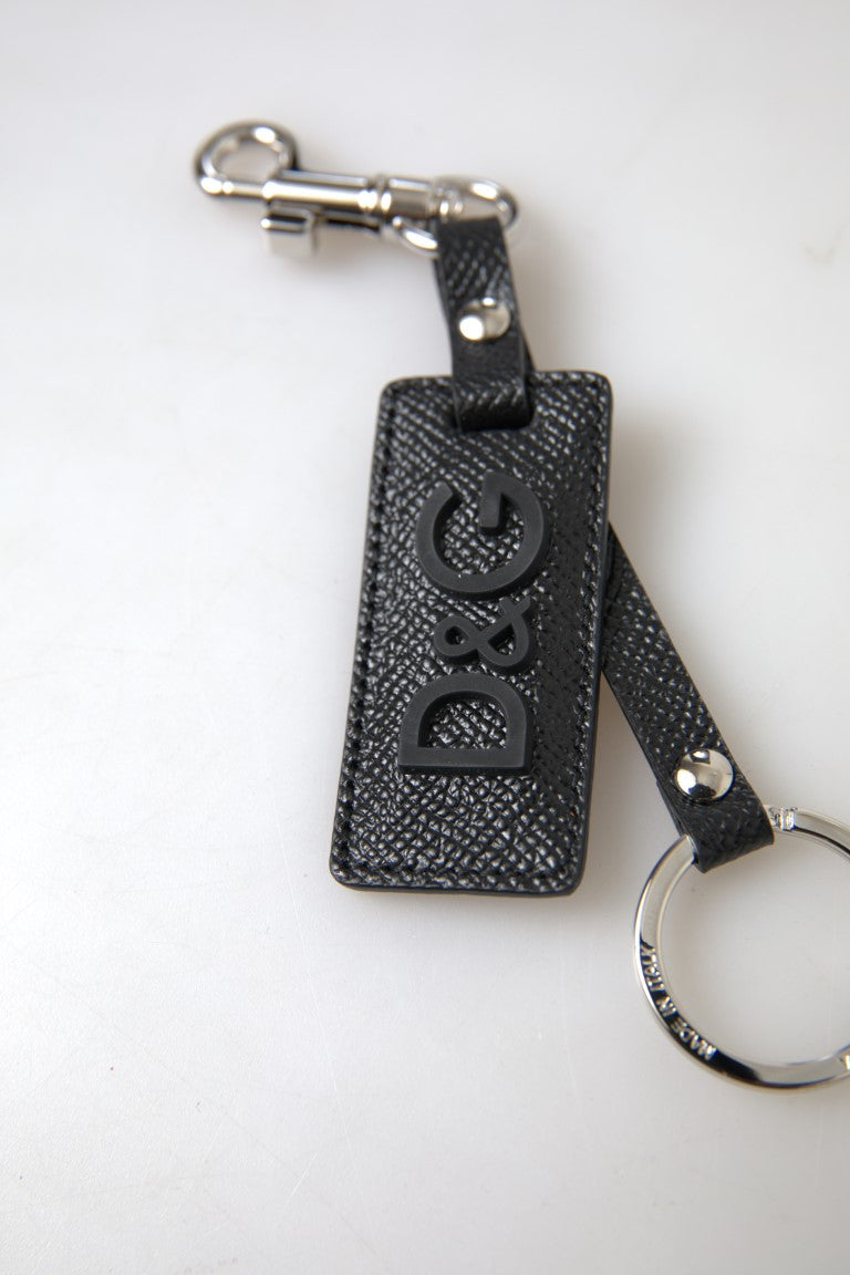 Llavero de metal plateado de cuero con logo DG negro
