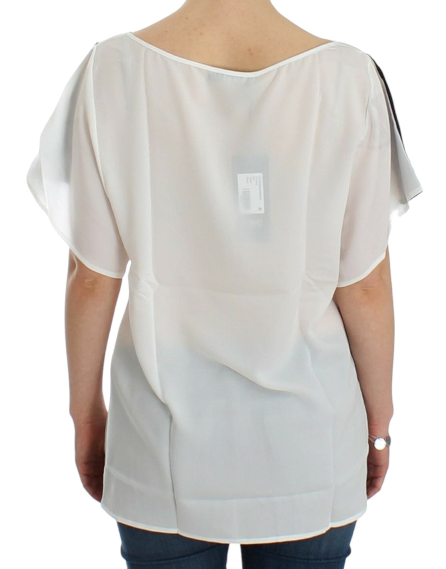 Blusa blanca con estampado de motivos