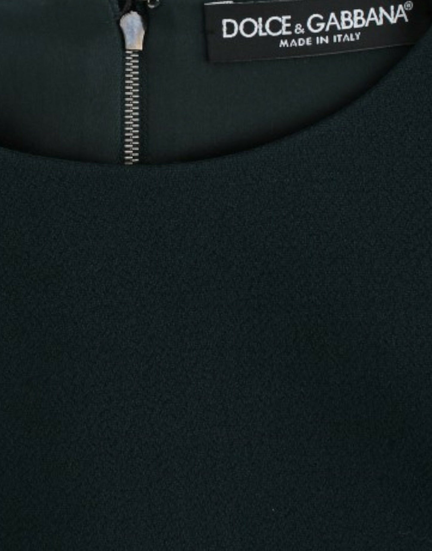 Blusa verde in lana con maniche a 3/4