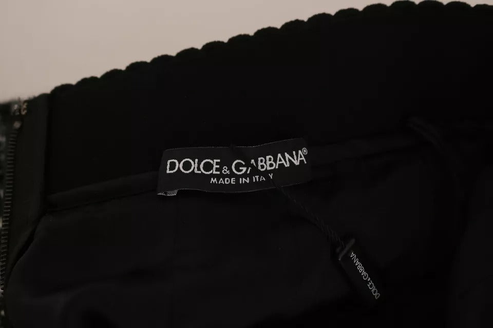 Dolce & Gabbana – Schwarzer Minirock aus Wolle mit Karomuster und Volantdetail