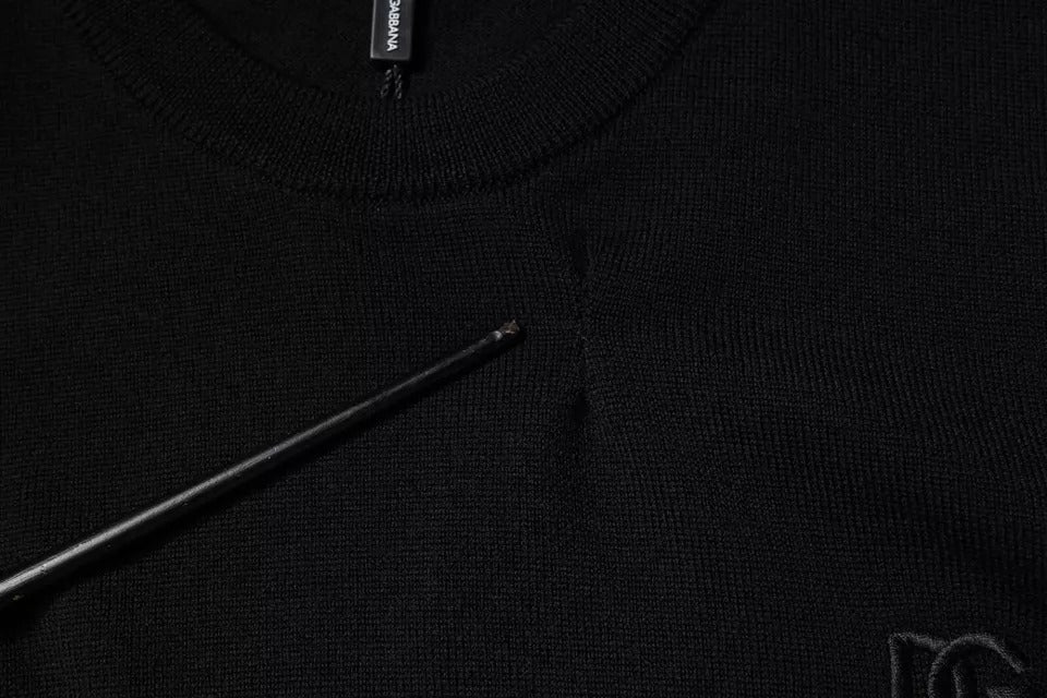 Dolce & Gabbana – Schwarzer Pullover aus Wolle mit Rundhalsausschnitt und Logo