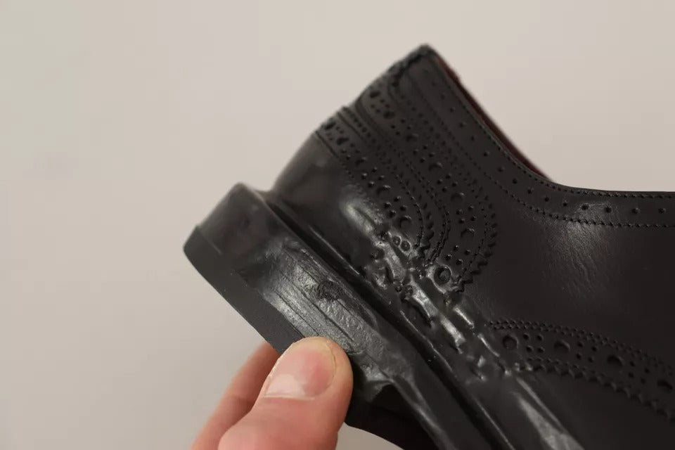 Dolce & Gabbana – Schwarze Derby-Schnürschuhe aus perforiertem Leder