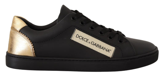 Dolce &amp; Gabbana Schicke schwarze und goldene niedrige Ledersneaker