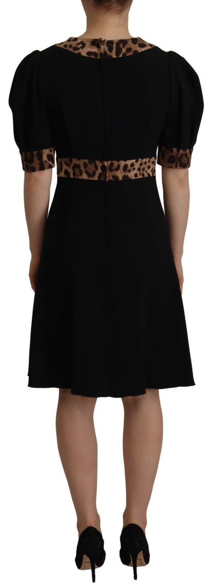 Dolce &amp; Gabbana Elegantes schwarzes A-Linien-Kleid mit V-Ausschnitt
