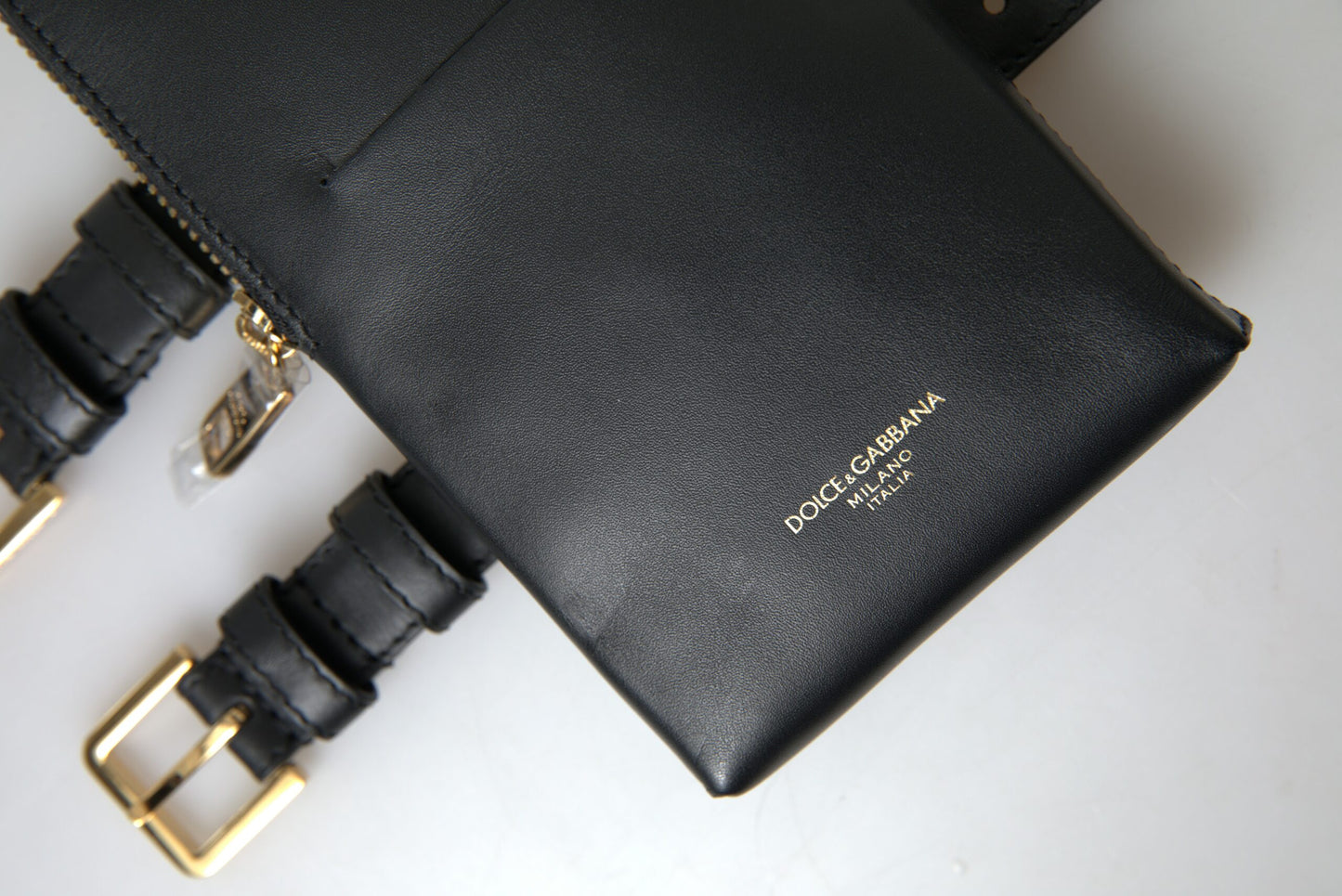 Dolce &amp; Gabbana – Elegante Clutch aus Leder mit Handgelenksriemen